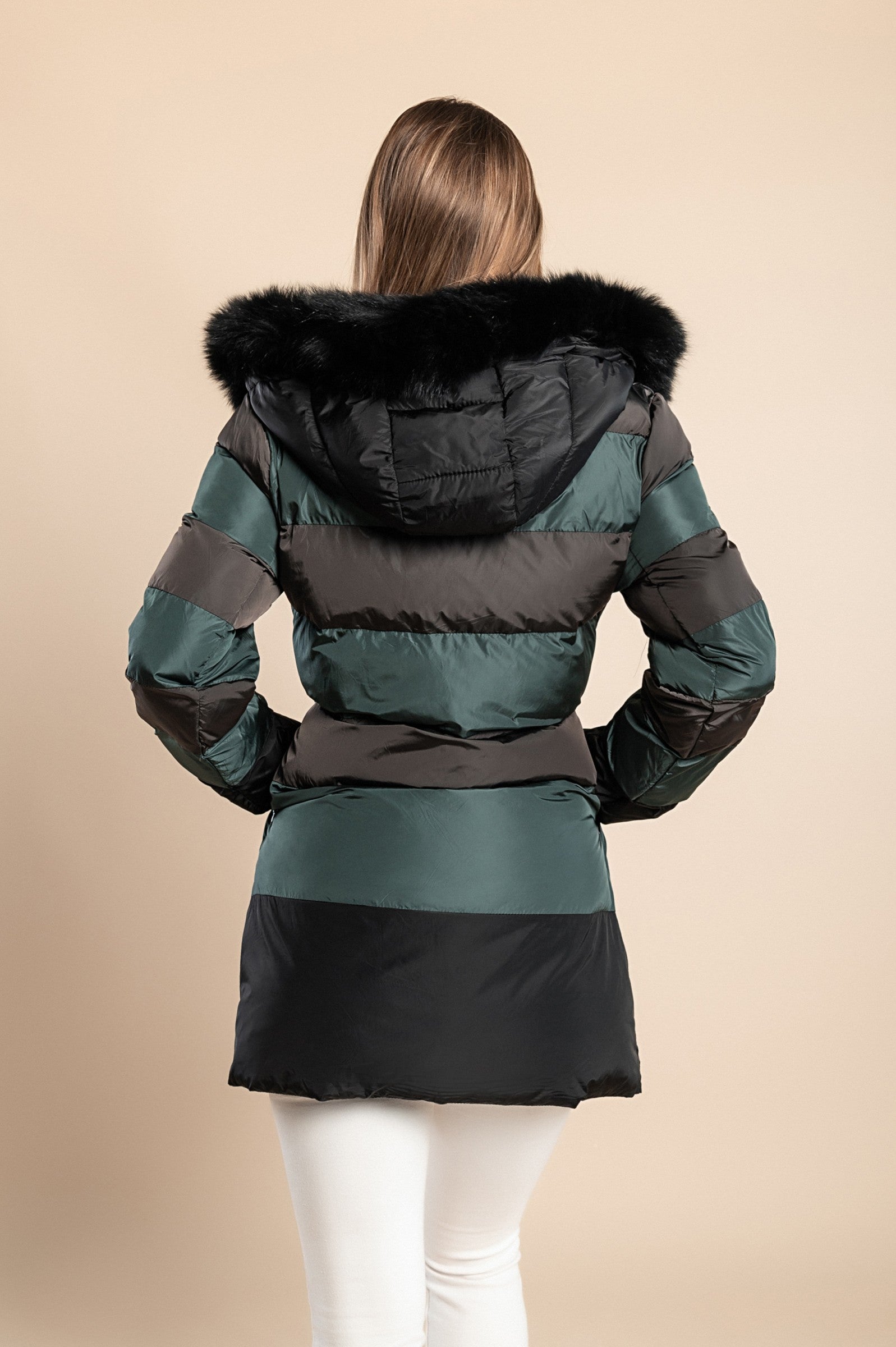 Long petrol jacket with hood and faux fur trim, featuring a high collar and zip closure, perfect for cold weather.