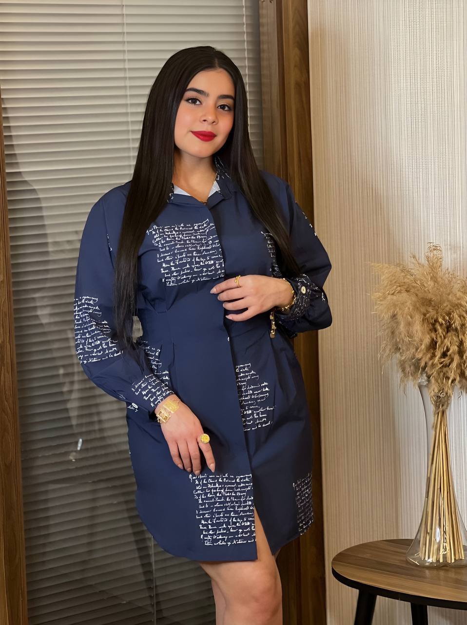 A stylish Long Sleeved Tshirt Dress featuring a unique graphic design, perfect for any occasion.