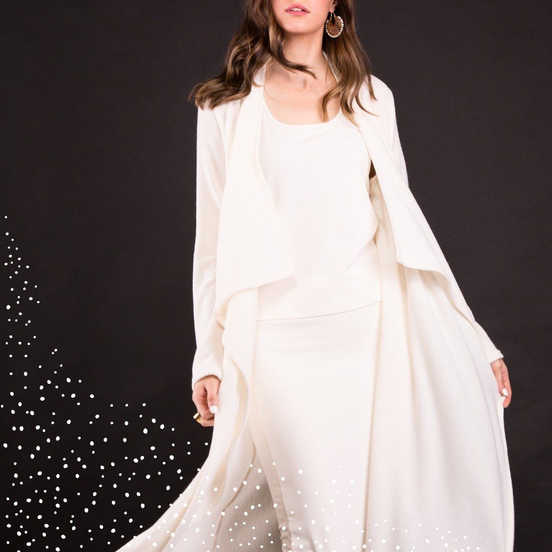 A stylish Mirage Knit Long Wave Cardi in a contemporary design, showcasing its soft fabric and elegant drape.