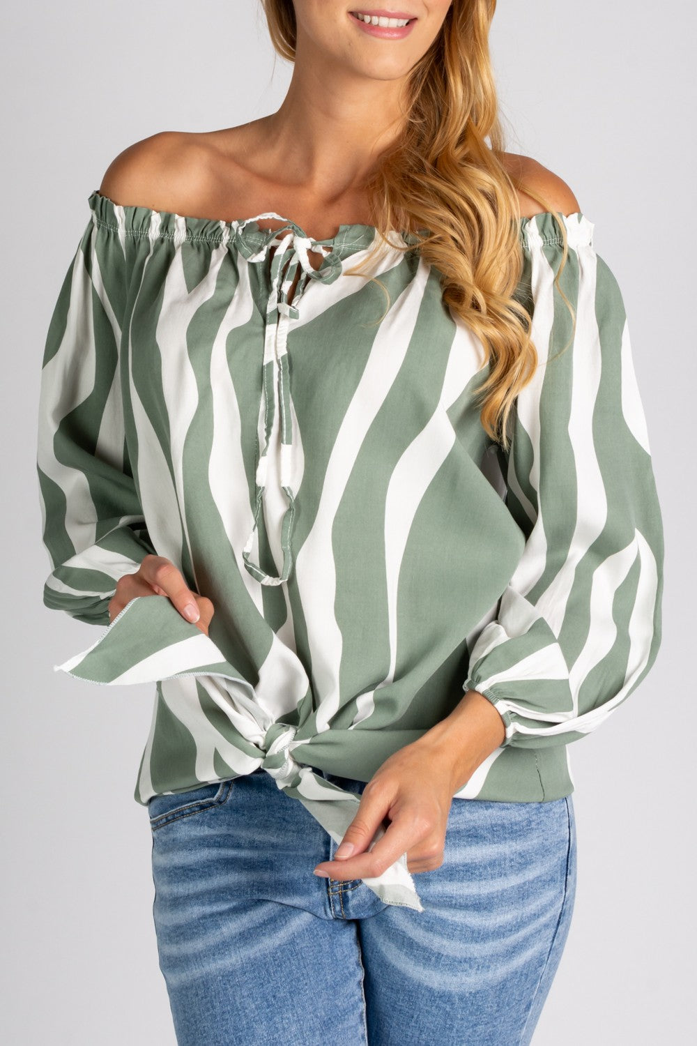 Loose blouse with open shoulders and drawstring tie, made of high-quality viscose, featuring 3/4 sleeves and elastic around shoulders.