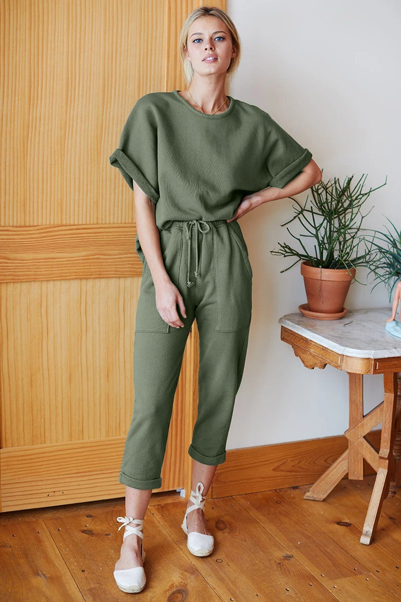 Loose Short Sleeve T-Shirt Crew Neck Tracksuit Set Otta in Olive, featuring a soft cotton fabric, elastic waist trousers, and rolled hem sleeves.