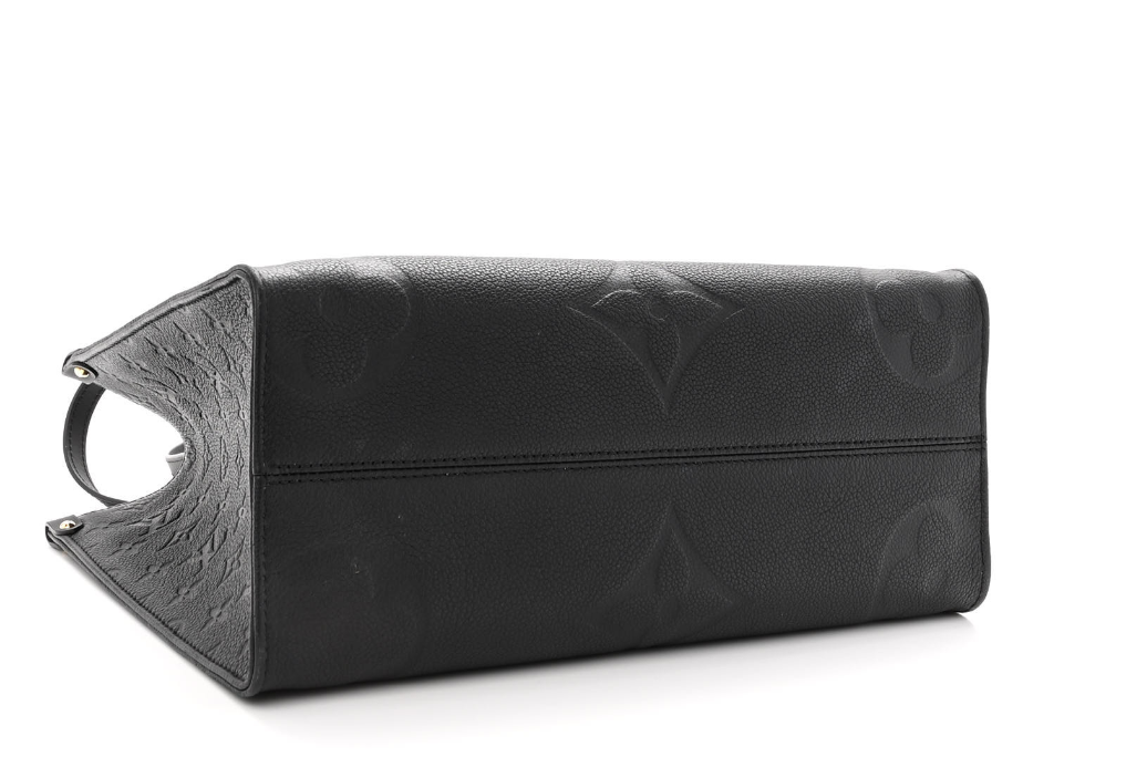 LOUIS VUITTON Empreinte Monogram Giant Onthego MM Black tote bag featuring oversized monogram print, rolled leather handles, and gold hardware.