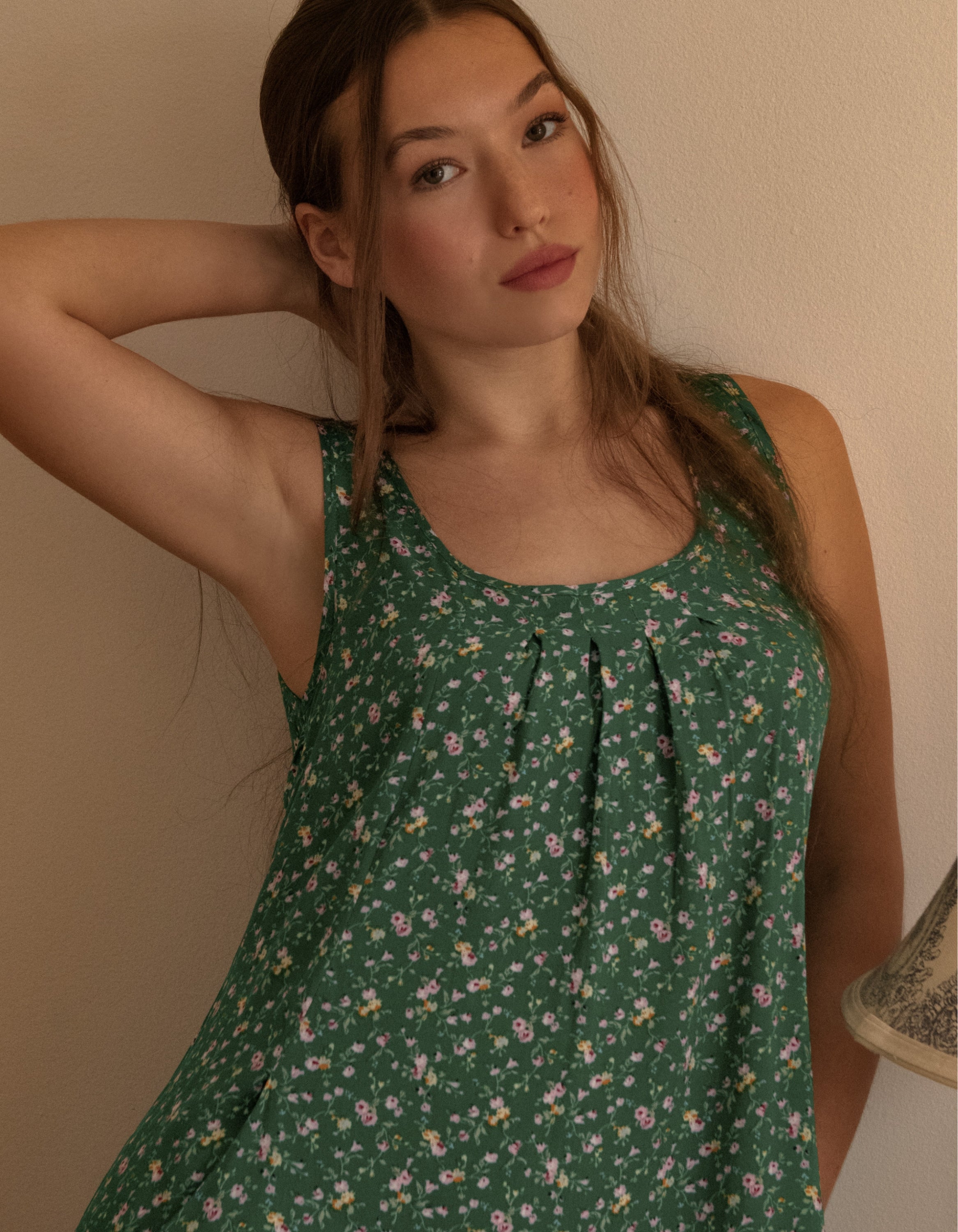 Louise Short Dress featuring a ditsy floral print in Navy, Red, and Green, showcasing a flattering A-line silhouette and side pockets.