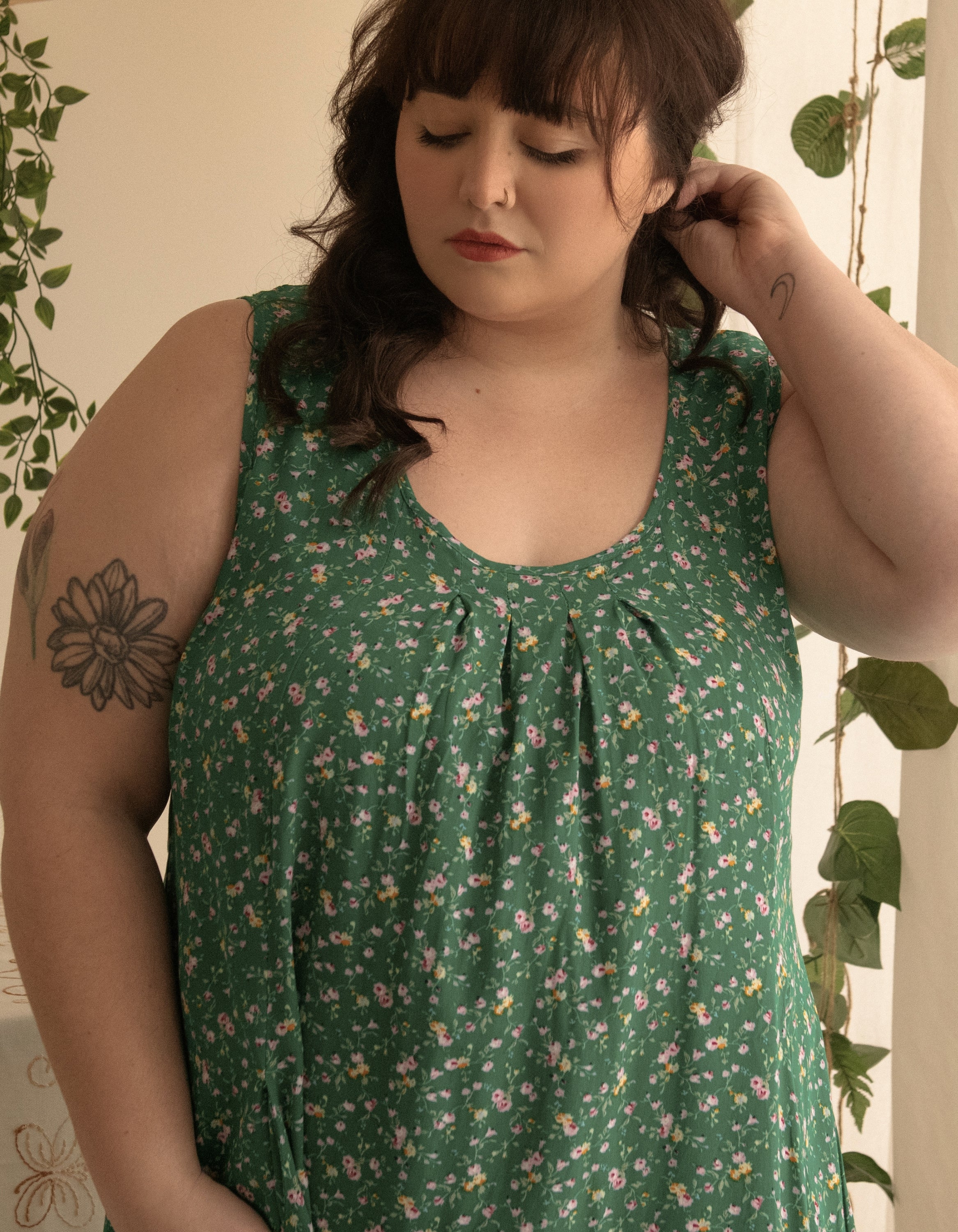 Louise Short Dress featuring a ditsy floral print in Navy, Red, and Green, showcasing a flattering A-line silhouette and side pockets.