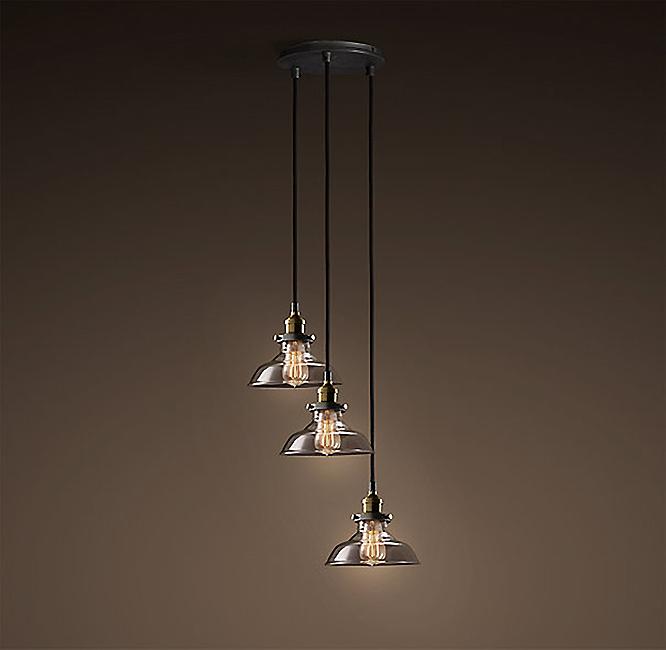 Lulu Adjustable Cord 3-light Clear Glass Edison Lamp with black fixture and clear glass shades, showcasing adjustable cord and elegant design.