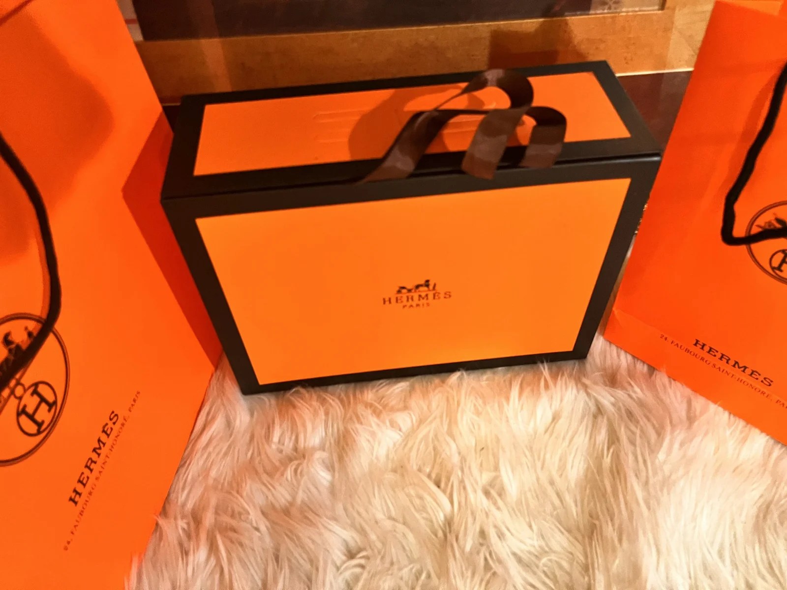 Luxurious Hermes-inspired box for handbags, showcasing elegant design and high-quality materials.