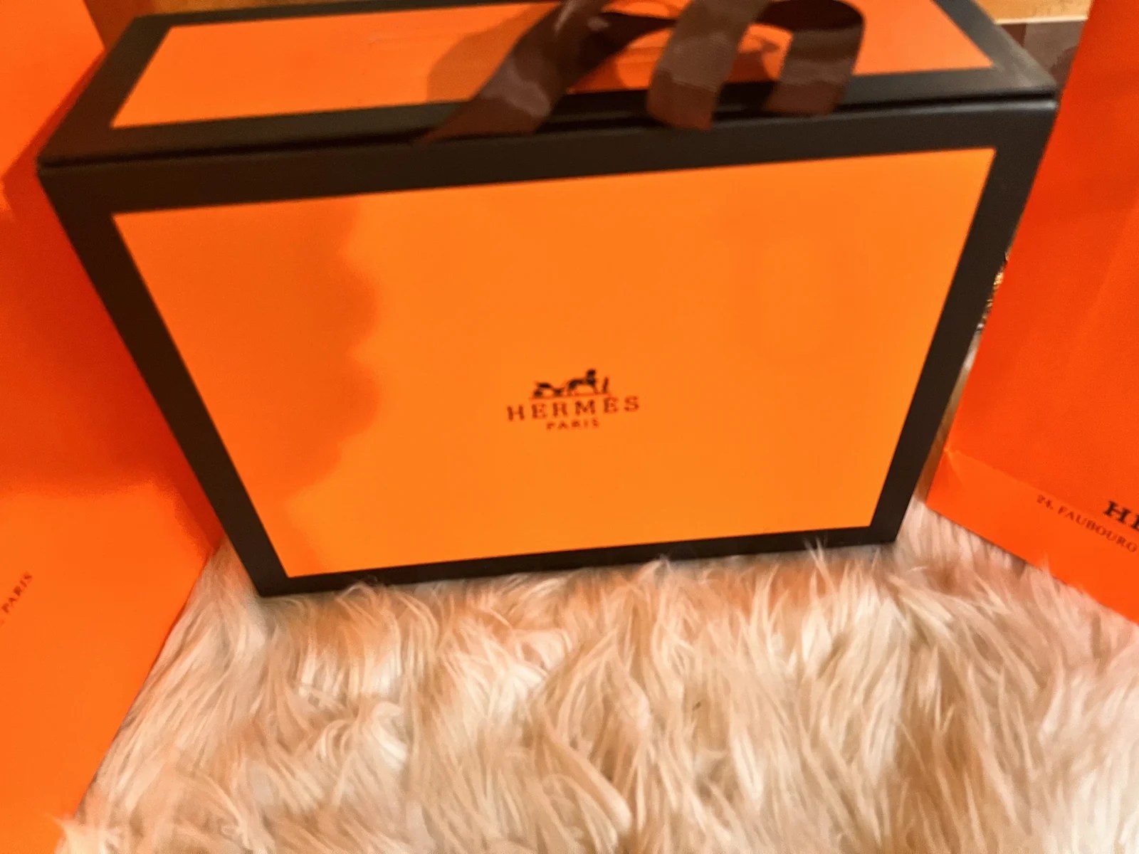 Luxurious Hermes-inspired box for handbags, showcasing elegant design and high-quality materials.