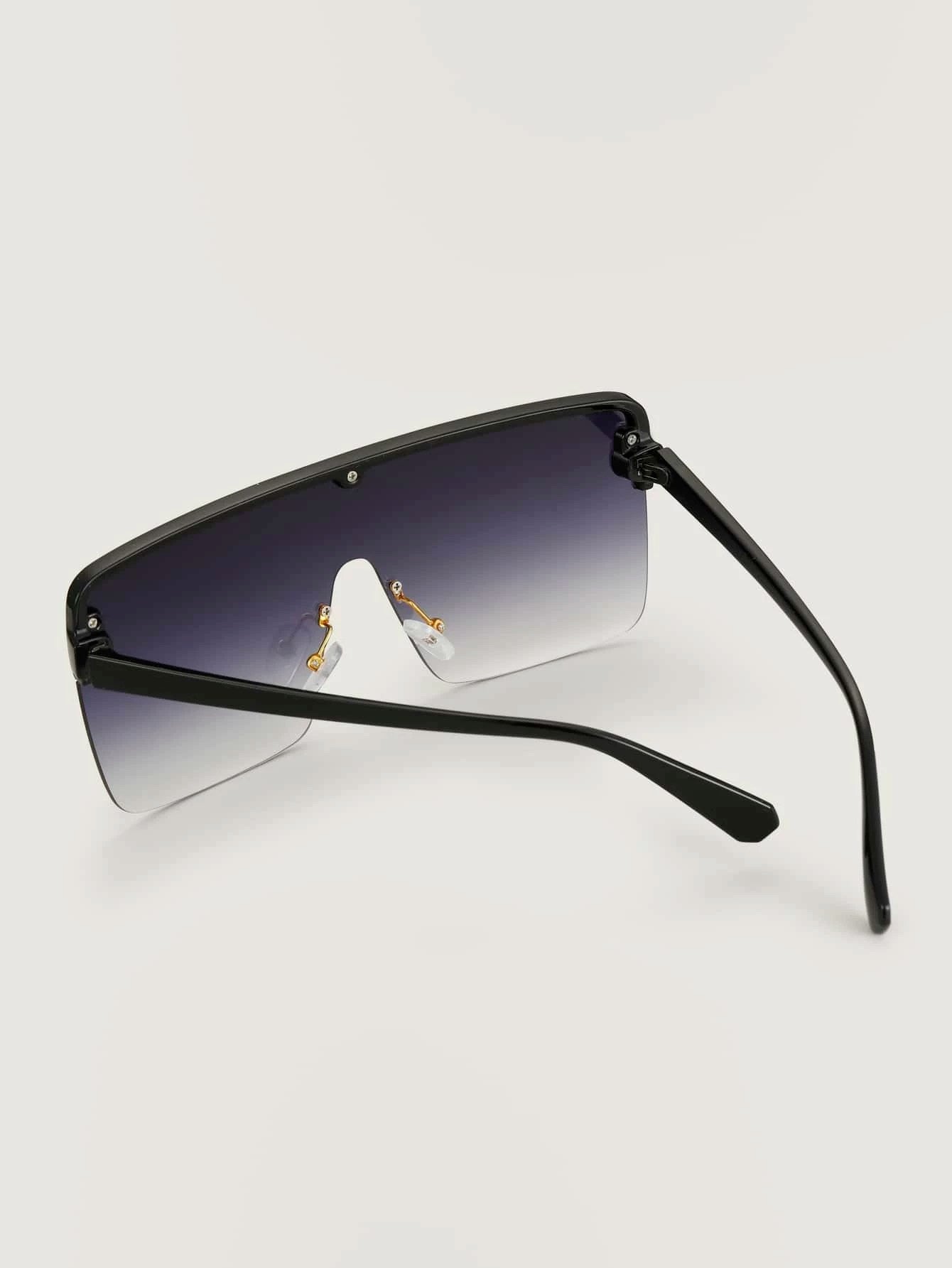Lux Flat Top Shield Sunglasses featuring a flat top design and vibrant purple lenses, perfect for stylish sun protection.
