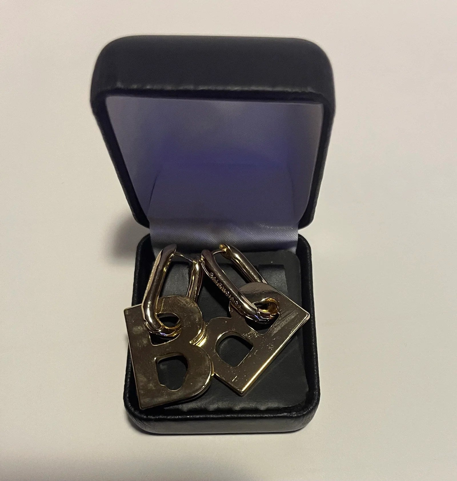 Lux Pendant Earrings by Balenciaga in gold, showcasing elegant design and high-quality craftsmanship.