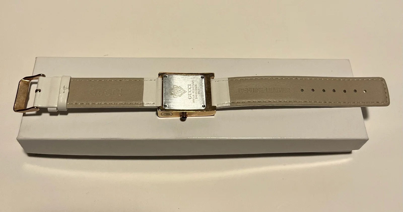 Lux Watch by Gucci in elegant white color, showcasing its high-quality replica design and stylish features.