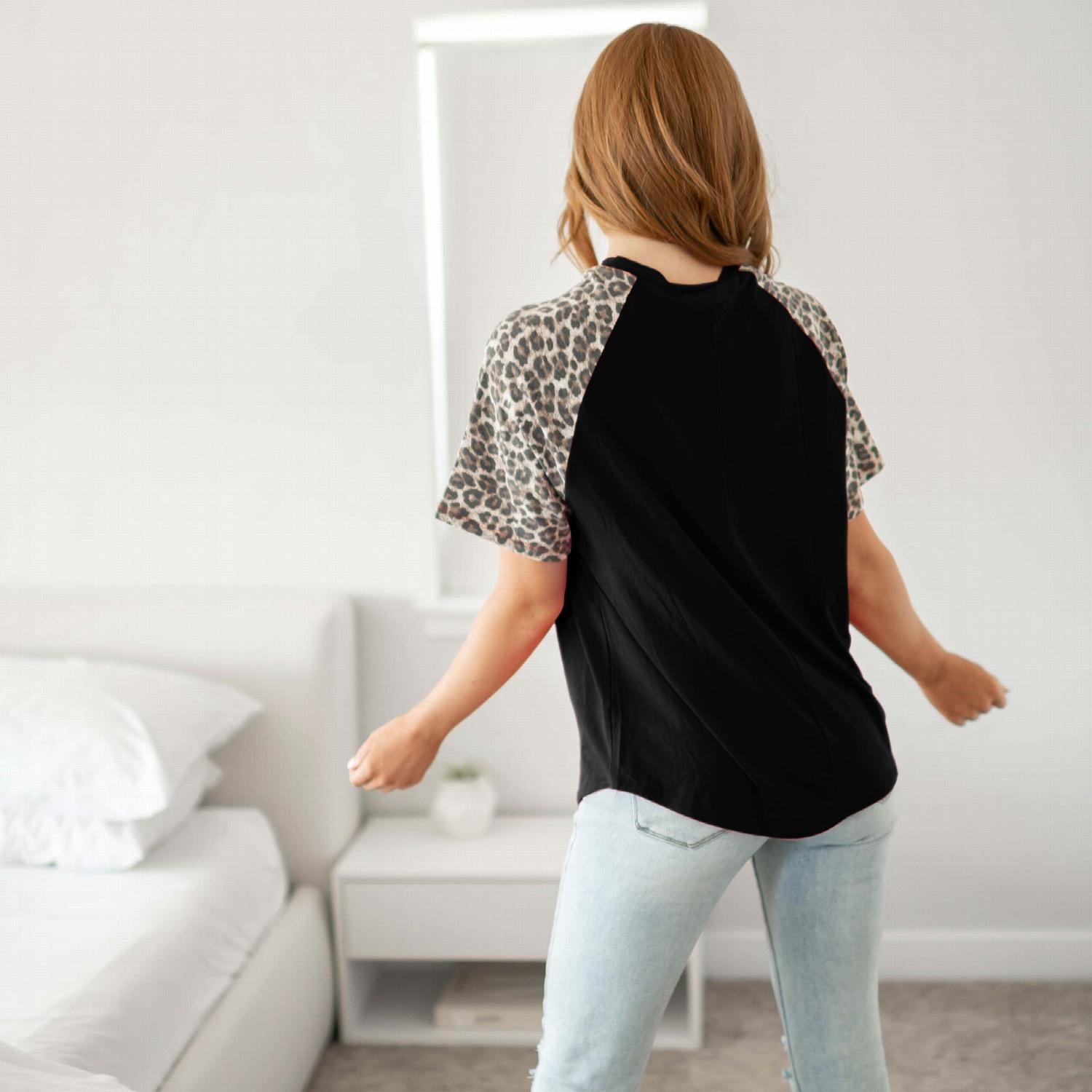 Luxe Rayon Leopard Raglan Sleeve Round Neck Top featuring a stylish leopard print and comfortable fit, perfect for casual or dressy occasions.