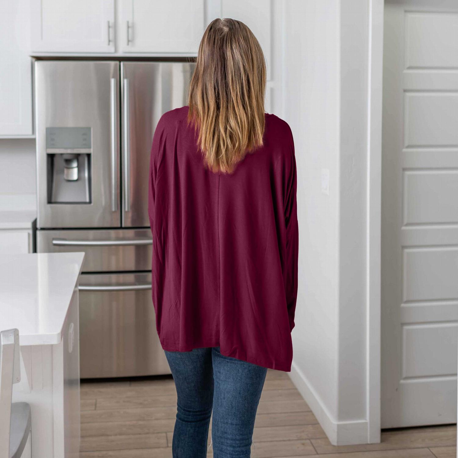 Luxe Rayon Oversized V-neck Front Pocket Top in soft fabric, featuring a stylish V-neck and large front pocket, perfect for casual wear.