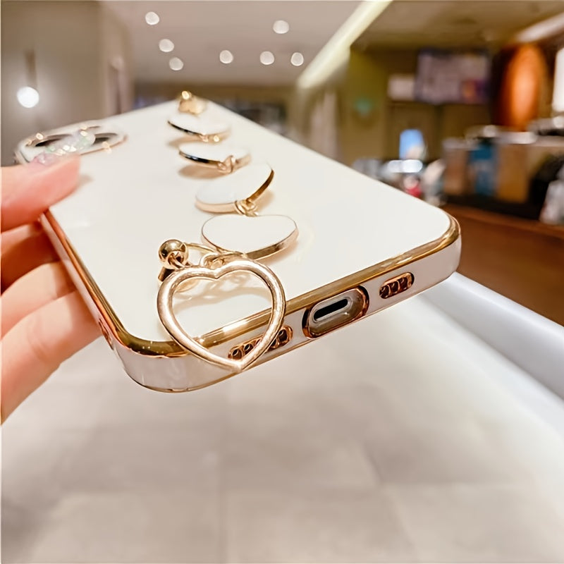Luxury Plated Heart Bracelet Phone Case featuring a glossy finish, designed for most smartphones with a stylish heart bracelet attachment.