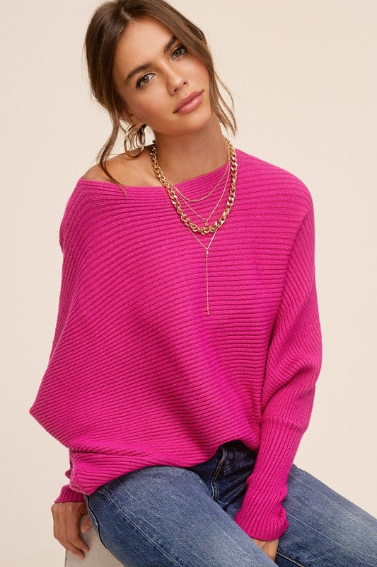 Mae Sweater featuring a ribbed knit design, boat neckline, and bubble sleeves in a cozy style.