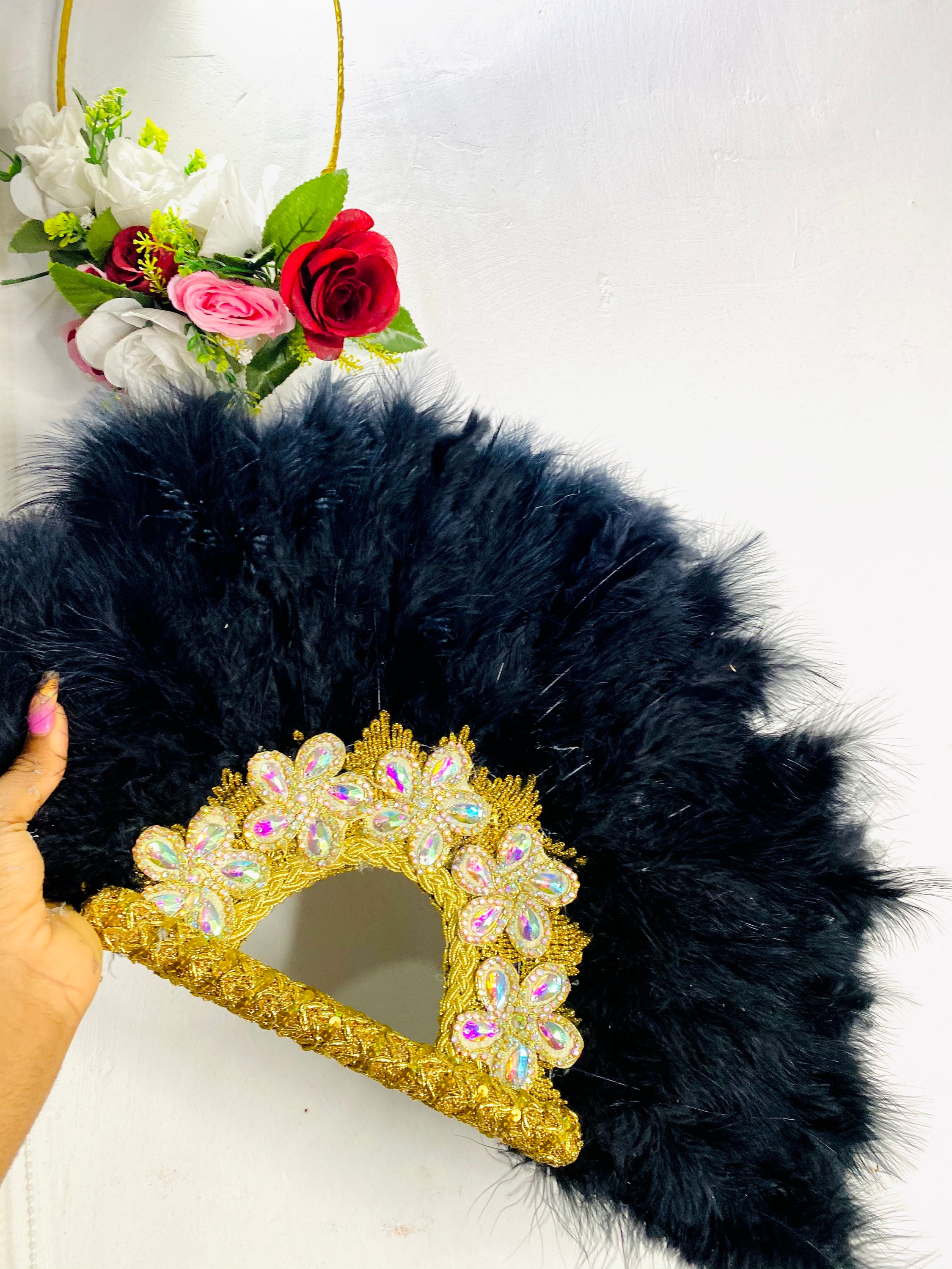 Malva Dance Fan featuring hibiscus-inspired design with five petal-like feathers, perfect for weddings and special events.