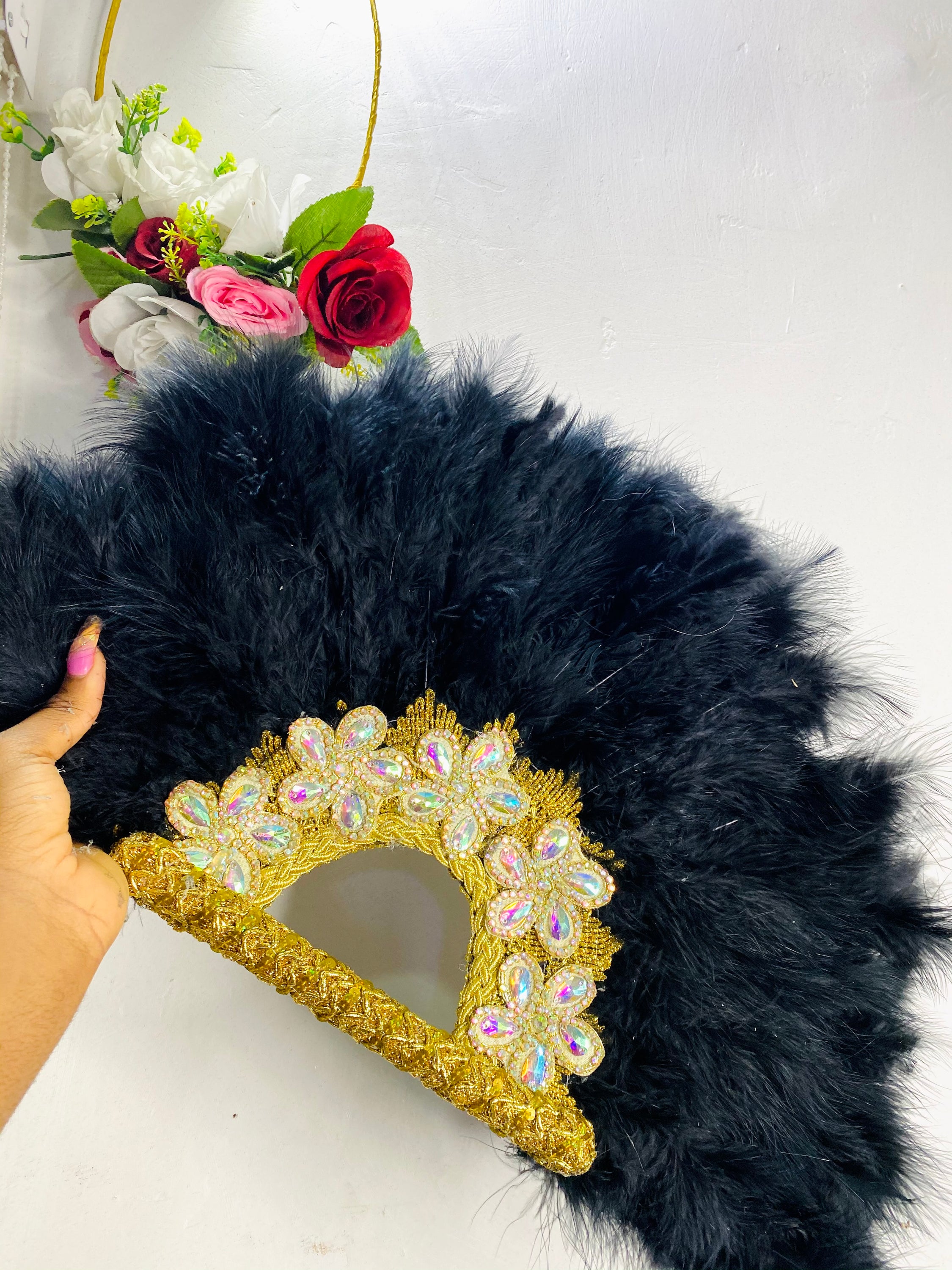 Malva Dance Fan featuring hibiscus-inspired design with five petal-like feathers, perfect for weddings and special events.