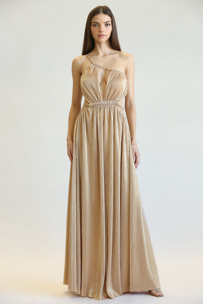 The Margot Dress featuring gold metallic plisse fabric, adjustable one-shoulder chain strap, and elegant cutout design.
