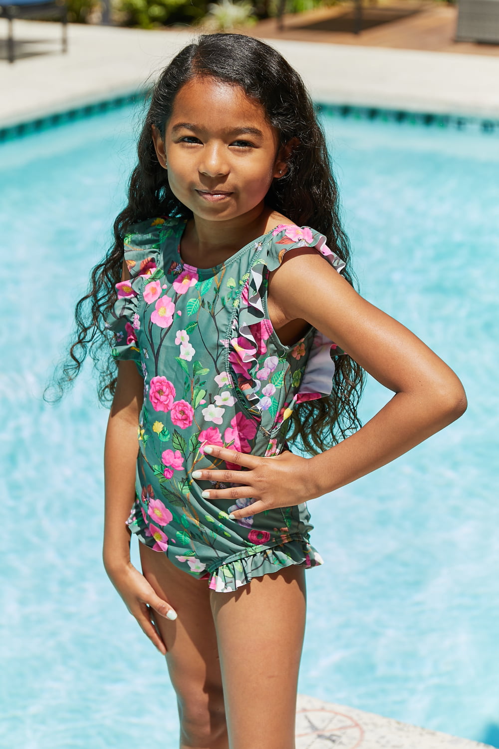 Marina West Bring Me Flowers V-Neck One Piece Swimsuit in Sage with floral ruffle design, perfect for beach outings.