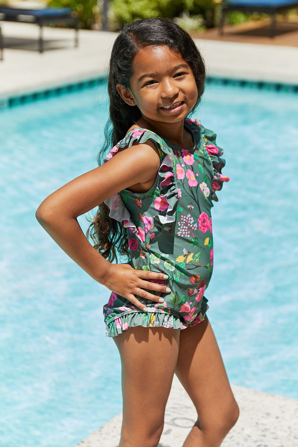 Marina West Bring Me Flowers V-Neck One Piece Swimsuit in Sage with floral ruffle design, perfect for beach outings.