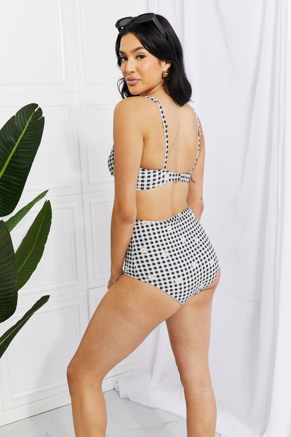 Marina West Swim Take A Dip Twist High-Rise Bikini in Black, featuring a twist-front top and high-rise bottoms, perfect for summer.
