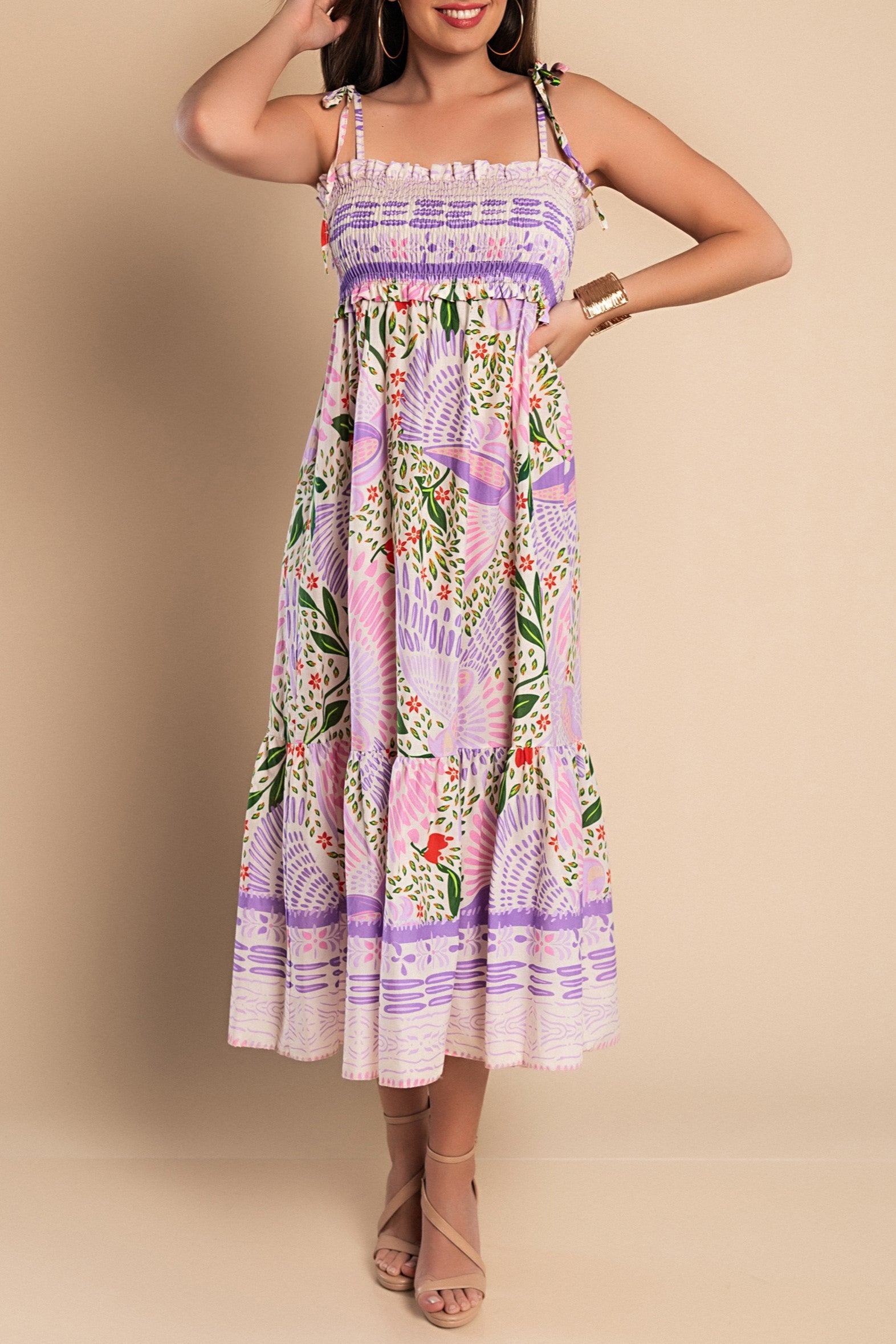 Elegant lilac maxi dress with multicolor print, featuring adjustable straps and a loose skirt, made from high-quality cotton.