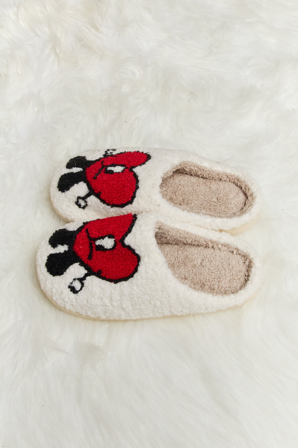 Melody Love Heart Print Plush Slippers featuring soft fleece and a charming heart pattern, perfect for cozy home wear.