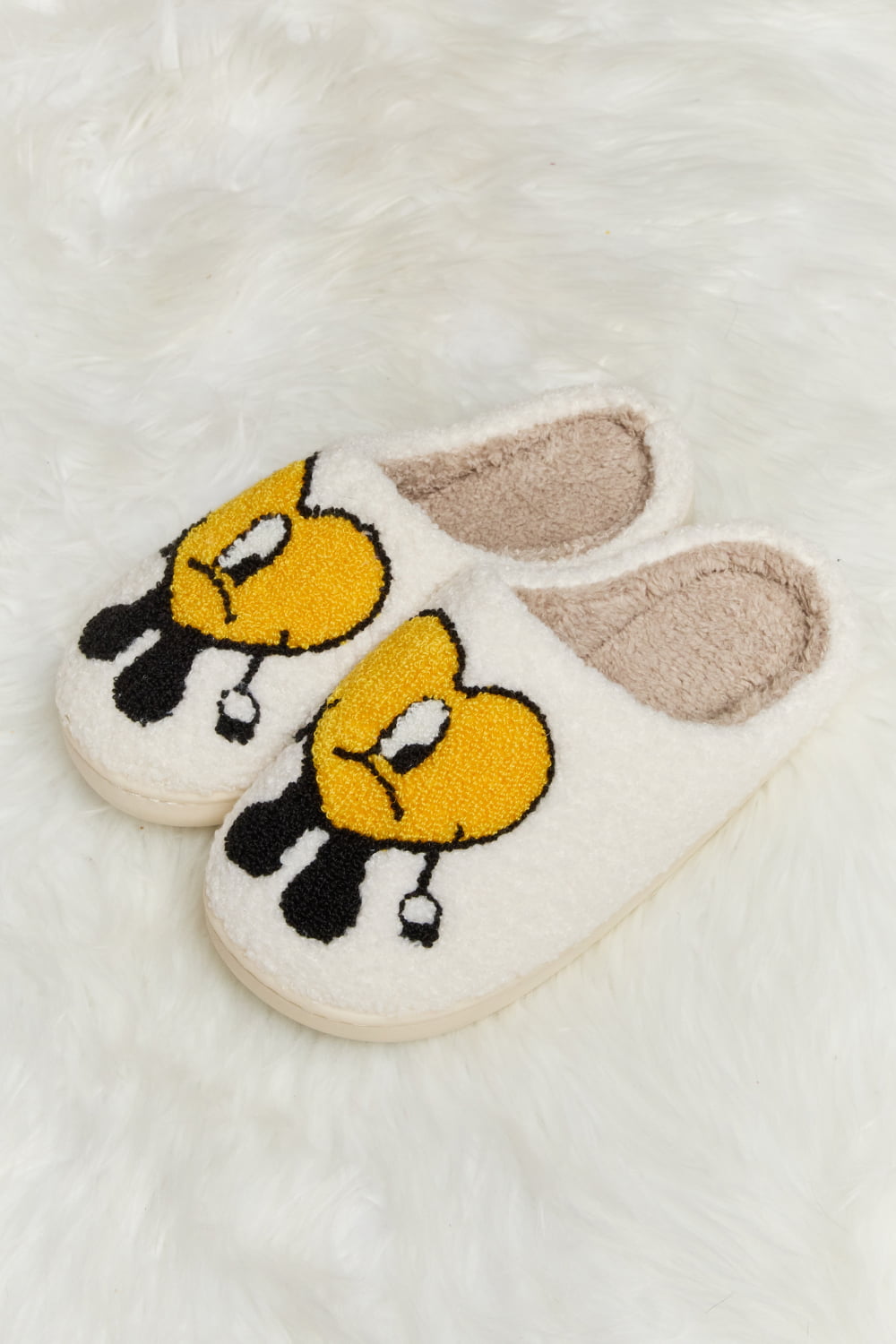 Melody Love Heart Print Plush Slippers featuring soft fleece and a charming heart pattern, perfect for cozy home wear.