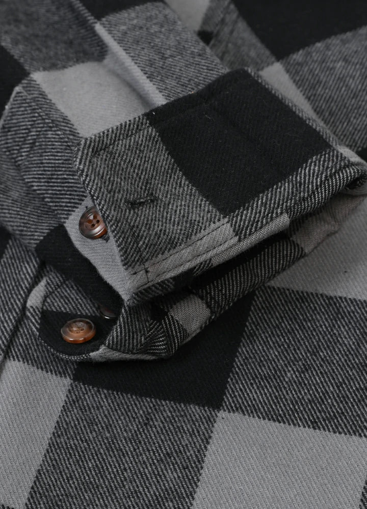 Men's Stalwart Heavyweight Flannel Shirt in plaid pattern, showcasing its relaxed fit and premium fabric.