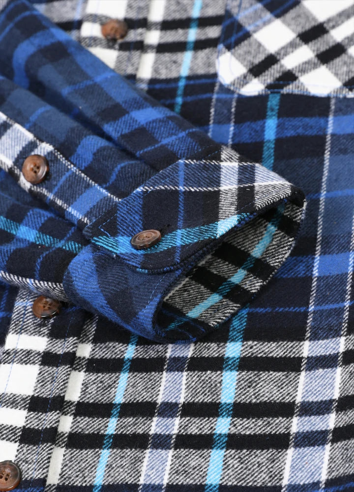 Men's Stalwart Heavyweight Flannel Shirt in plaid pattern, showcasing its relaxed fit and premium fabric.