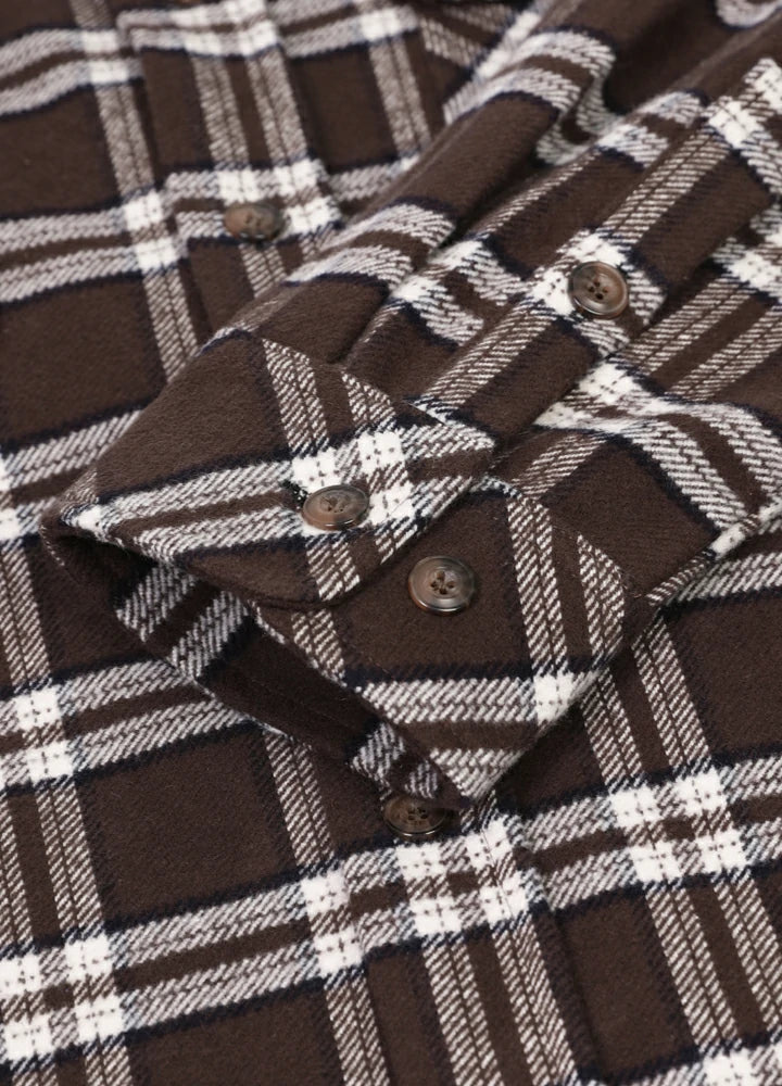 Men's Stalwart Heavyweight Flannel Shirt in plaid pattern, showcasing its relaxed fit and premium fabric.