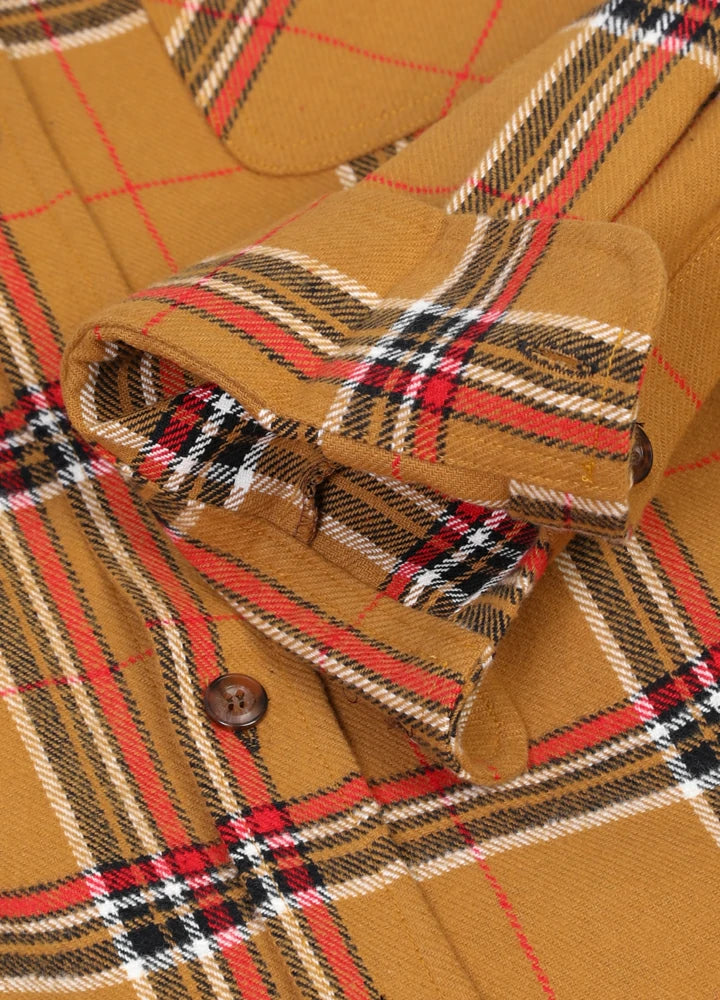 Men's Stalwart Heavyweight Flannel Shirt in plaid pattern, showcasing its relaxed fit and premium fabric.
