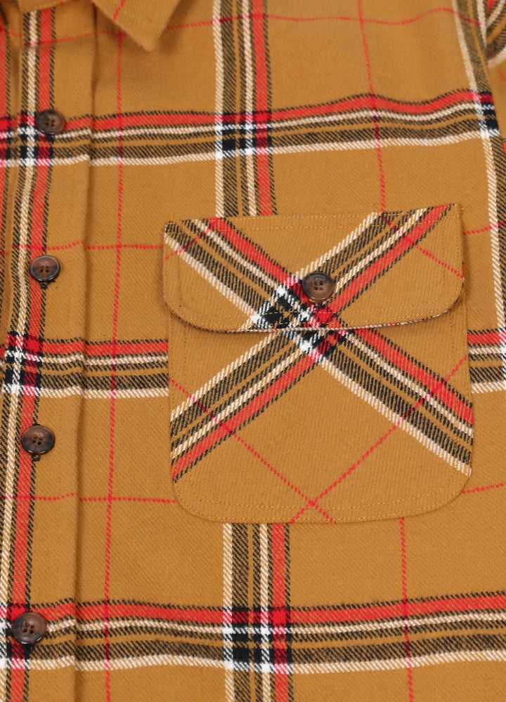 Men's Stalwart Heavyweight Flannel Shirt in plaid pattern, showcasing its relaxed fit and premium fabric.