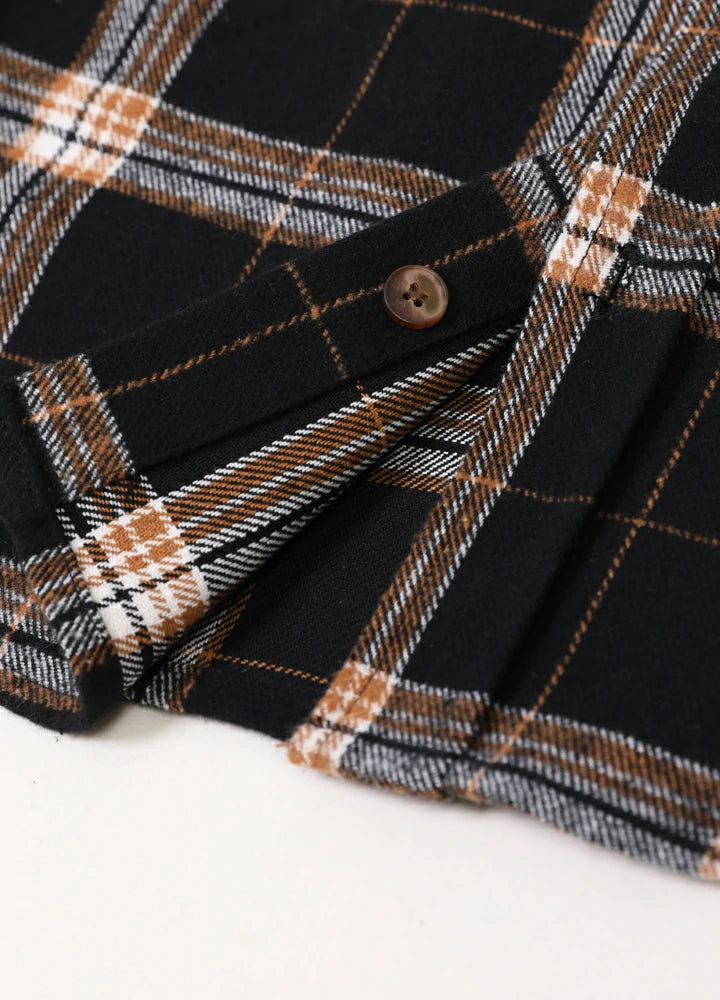 Men's Stalwart Heavyweight Flannel Shirt in plaid pattern, showcasing its relaxed fit and premium fabric.