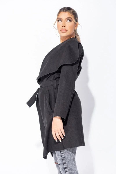 A stylish mid length oversized belted waterfall coat with a waterfall collar, perfect for layering over outfits.