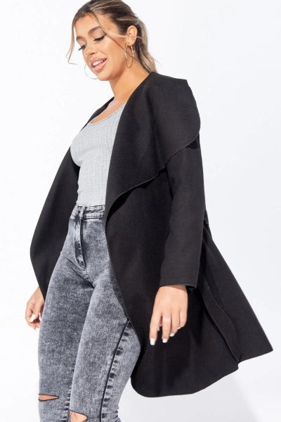 A stylish mid length oversized belted waterfall coat with a waterfall collar, perfect for layering over outfits.