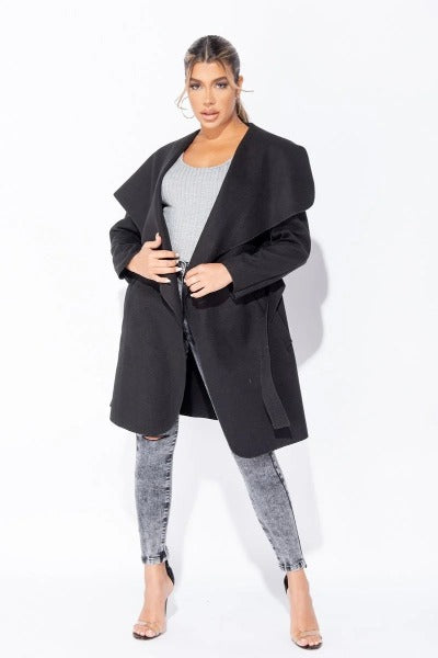 A stylish mid length oversized belted waterfall coat with a waterfall collar, perfect for layering over outfits.