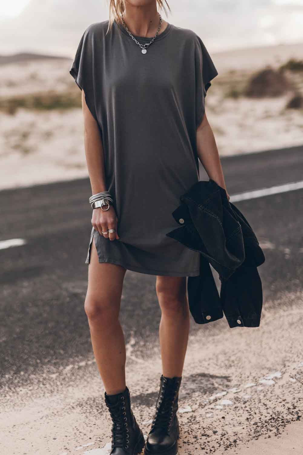 Gray mini dress with loose sleeves and round neckline, showcasing a comfortable and stylish design.
