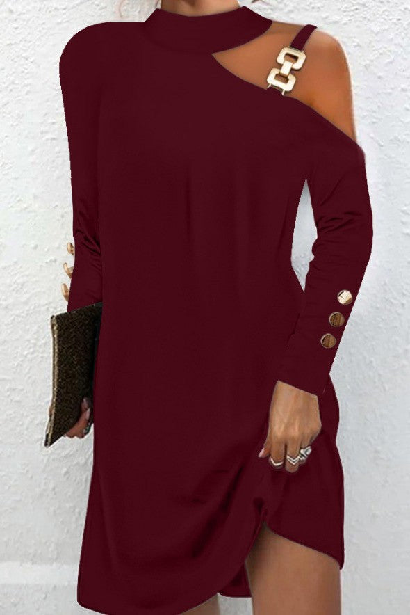 Burgundy mini dress featuring metallic detail, off-the-shoulder neckline, and long sleeves with decorative buttons.