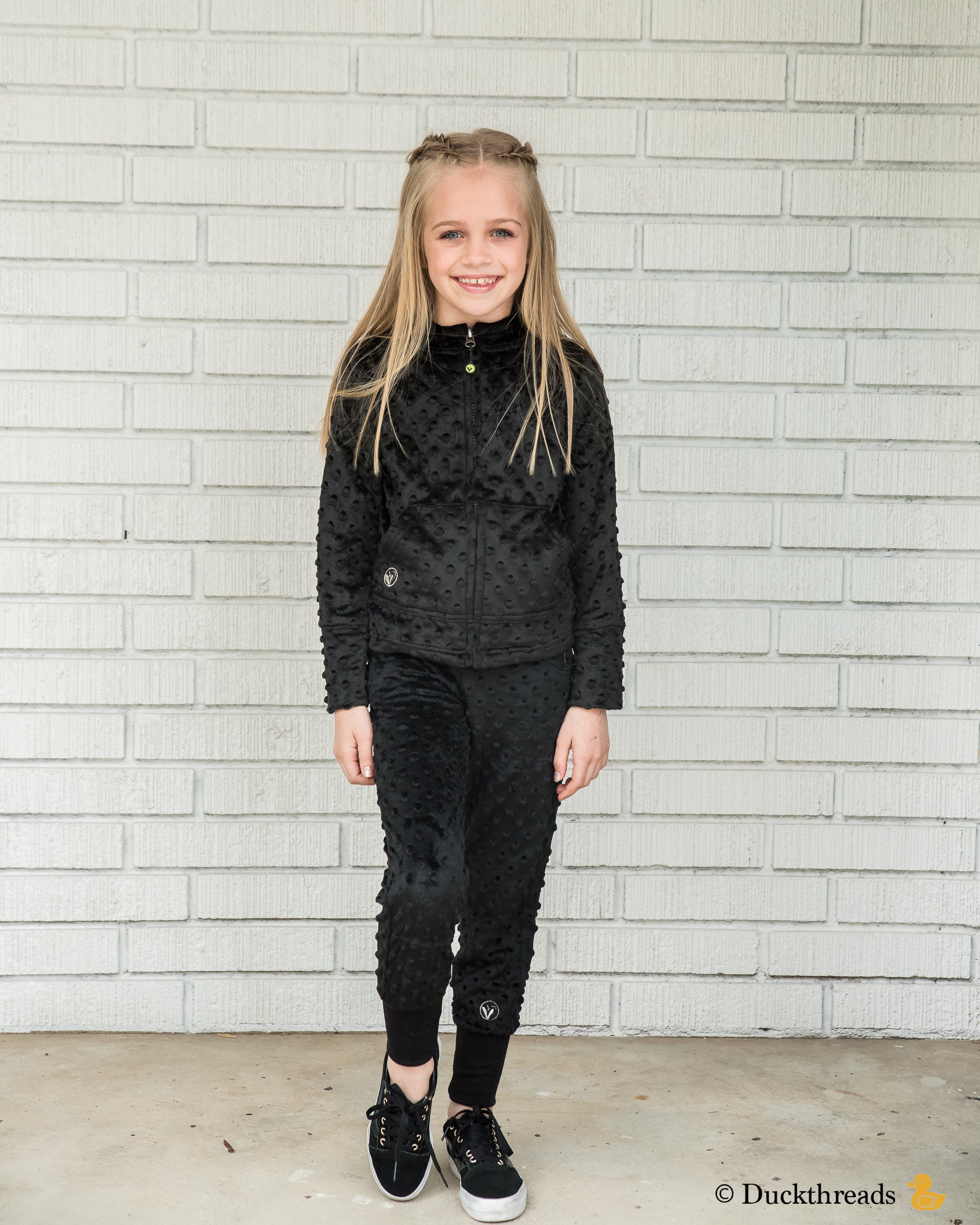 Black Minky Bubble slim-leg joggers featuring a drawstring waistband and ribbing bands for a stylish slim fit.