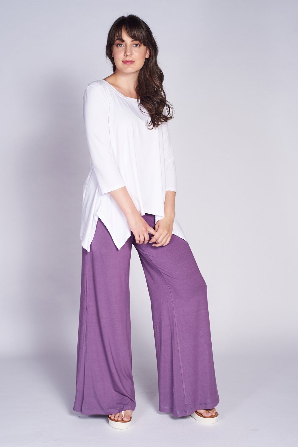 Montage Top in Bamboo fabric featuring a scoop neck and 3/4 sleeves, showcasing unique seam details at the shoulder and back.