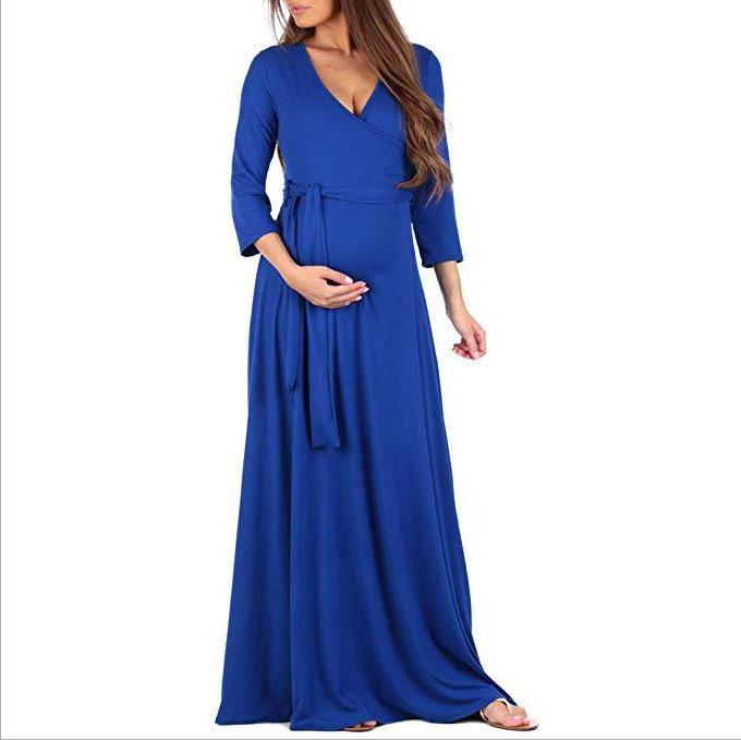 Mopping Dress featuring a deep V-neck and 3/4 sleeves, designed for pregnant women, showcasing a solid color fabric.
