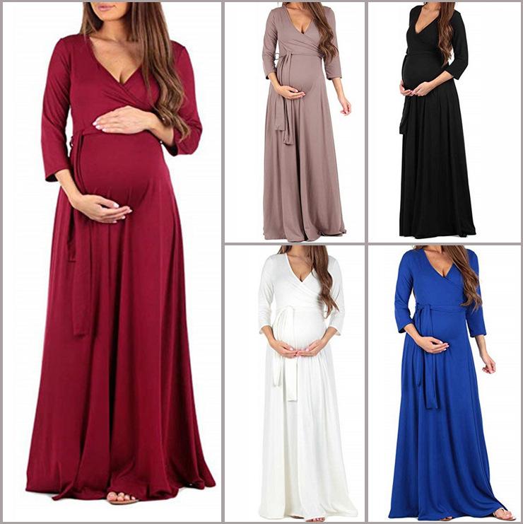 Mopping Dress featuring a deep V-neck and 3/4 sleeves, designed for pregnant women, showcasing a solid color fabric.