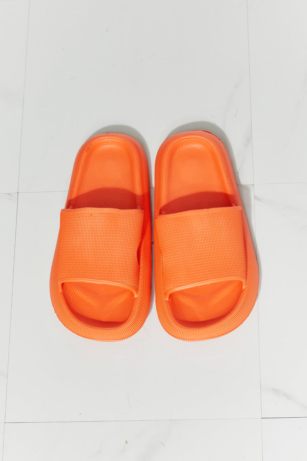 MMShoes Arms Around Me Open Toe Slide in vibrant orange, showcasing its stylish rubber design and open toe feature.