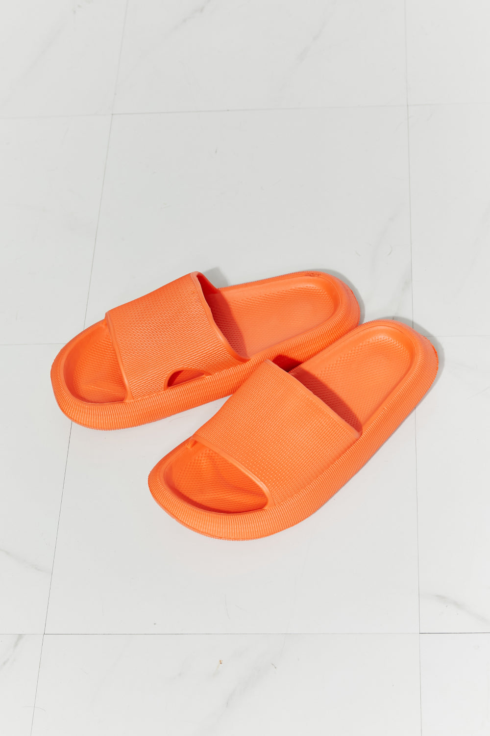 MMShoes Arms Around Me Open Toe Slide in vibrant orange, showcasing its stylish rubber design and open toe feature.