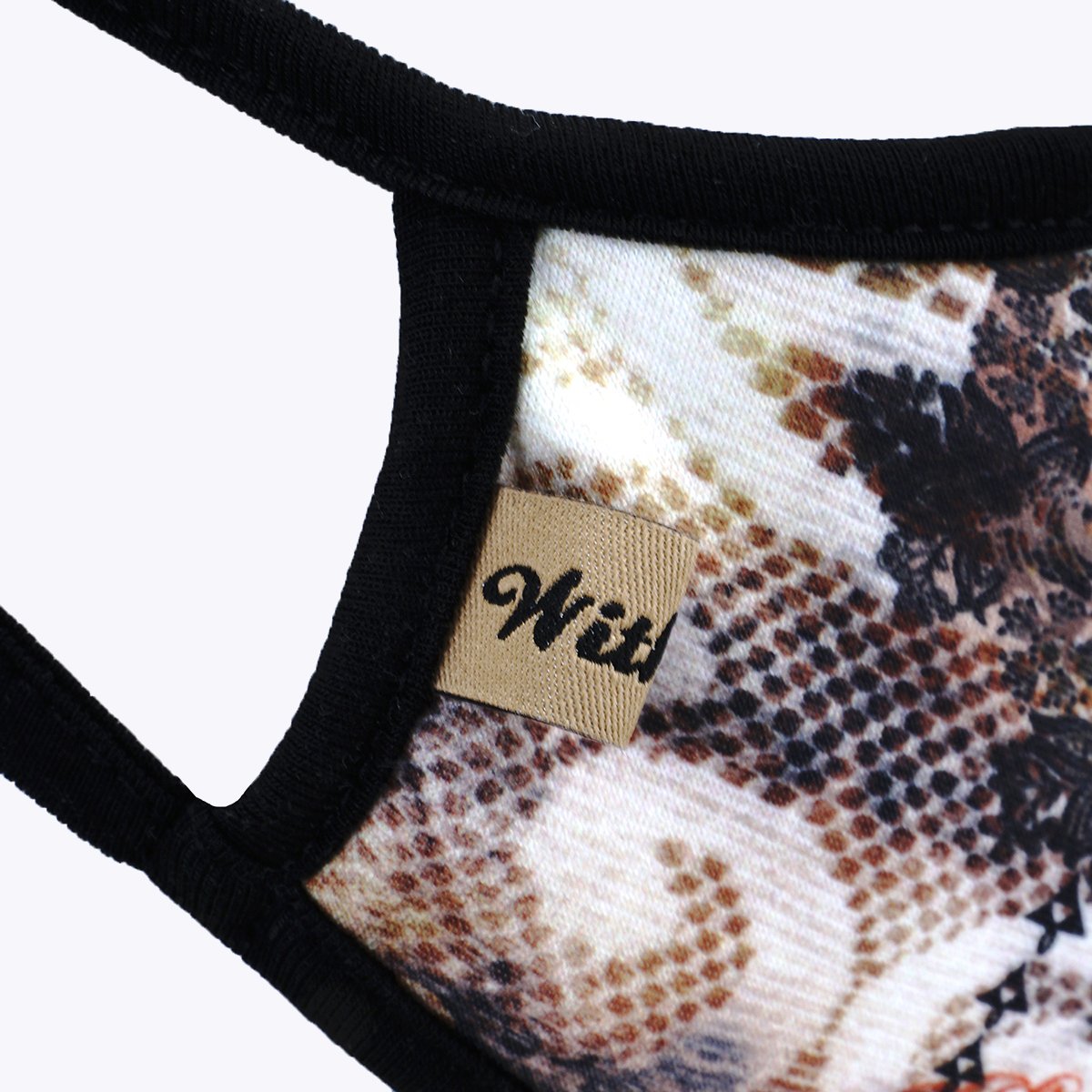 Multi DaCover 3-Layered Face Cover in unique print design, showcasing its polyester exterior and cotton interior.