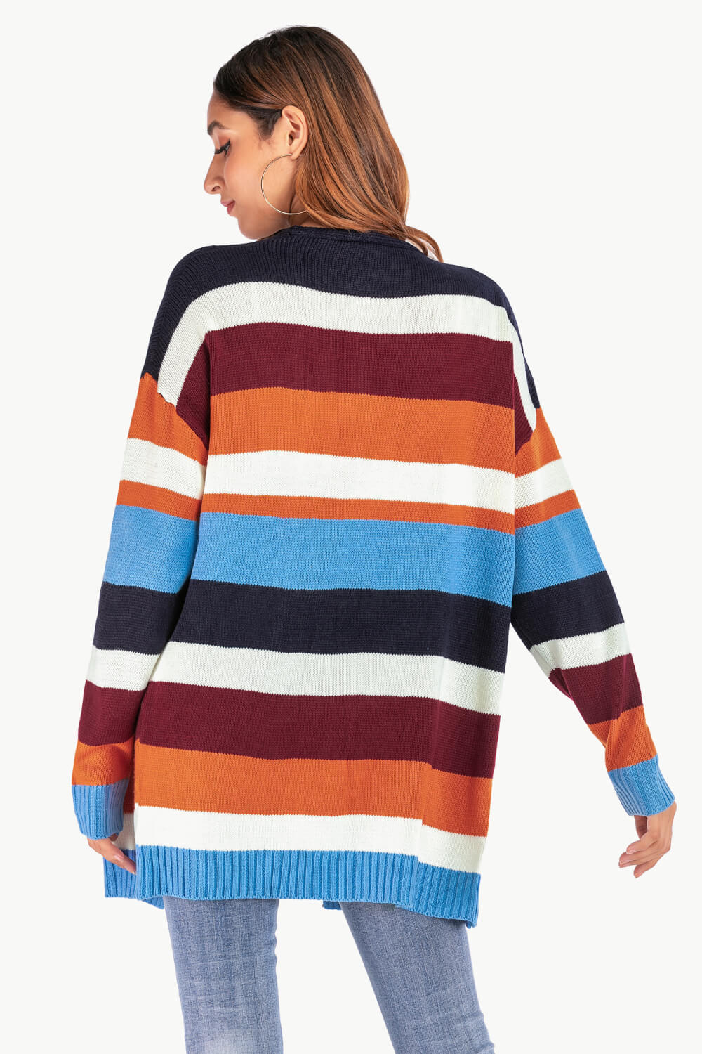 A stylish multicolored striped cardigan with an open front and dropped shoulder sleeves, perfect for casual chic outfits.
