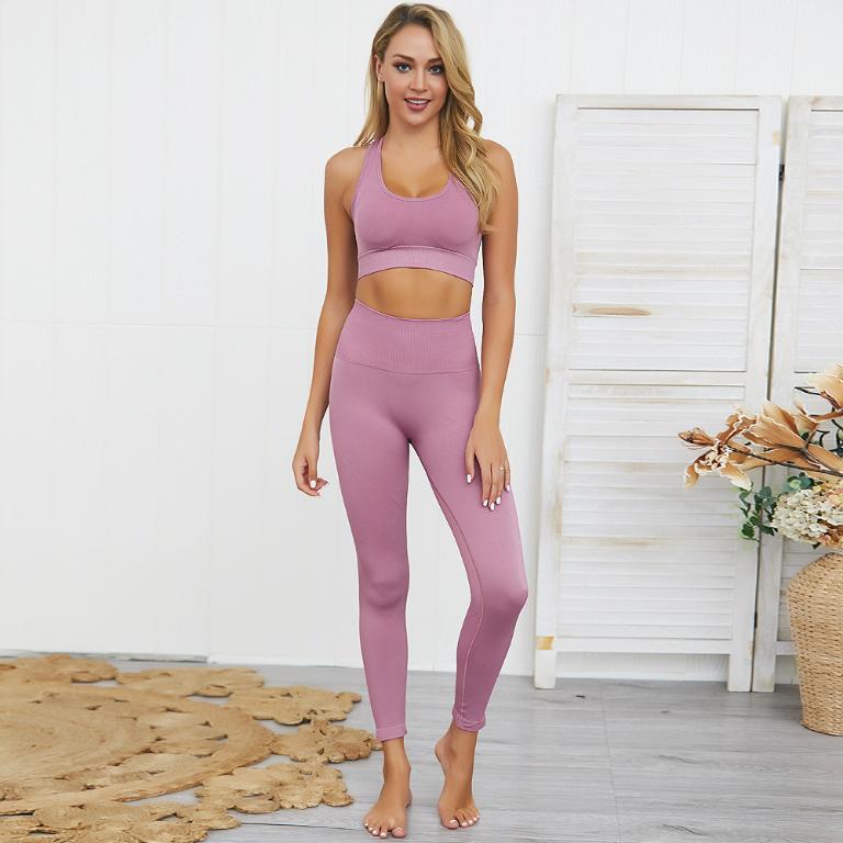 A stylish muted color yoga set made of nylon and spandex, featuring a comfortable fit and modern design, perfect for yoga and workouts.