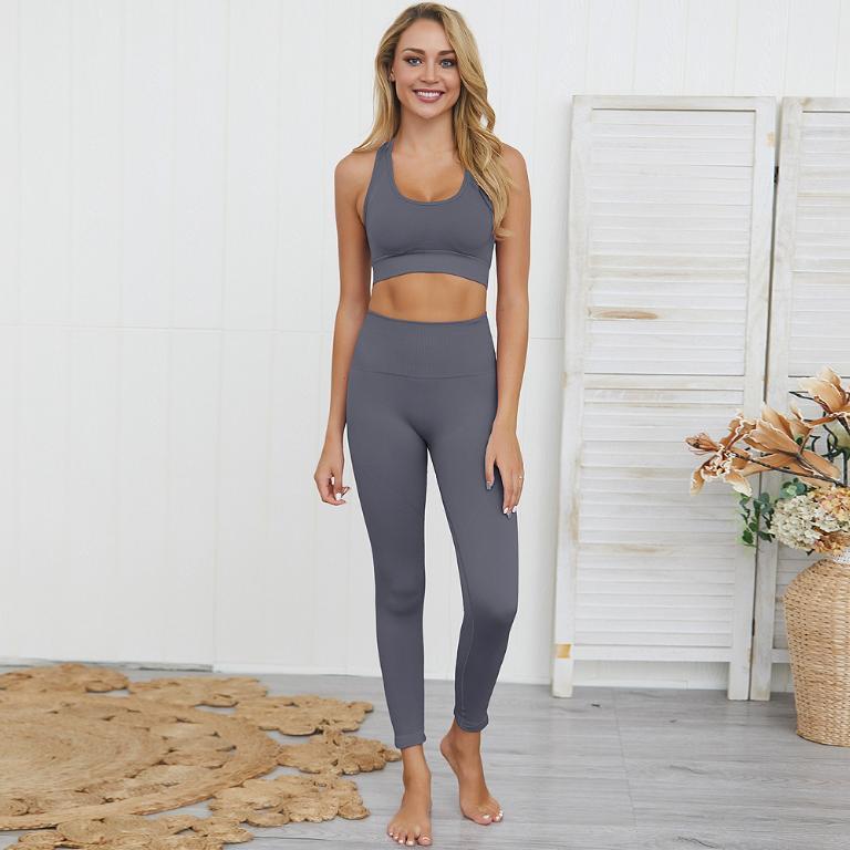 A stylish muted color yoga set made of nylon and spandex, featuring a comfortable fit and modern design, perfect for yoga and workouts.
