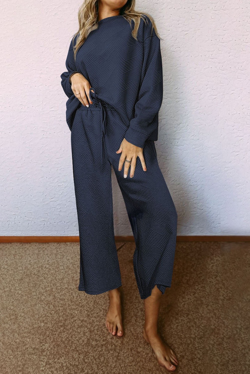 Navy Blue Ultra Loose Textured 2pcs Slouchy Outfit featuring a long-sleeved top and wide-leg pants with drawstrings, showcasing a relaxed and stylish look.
