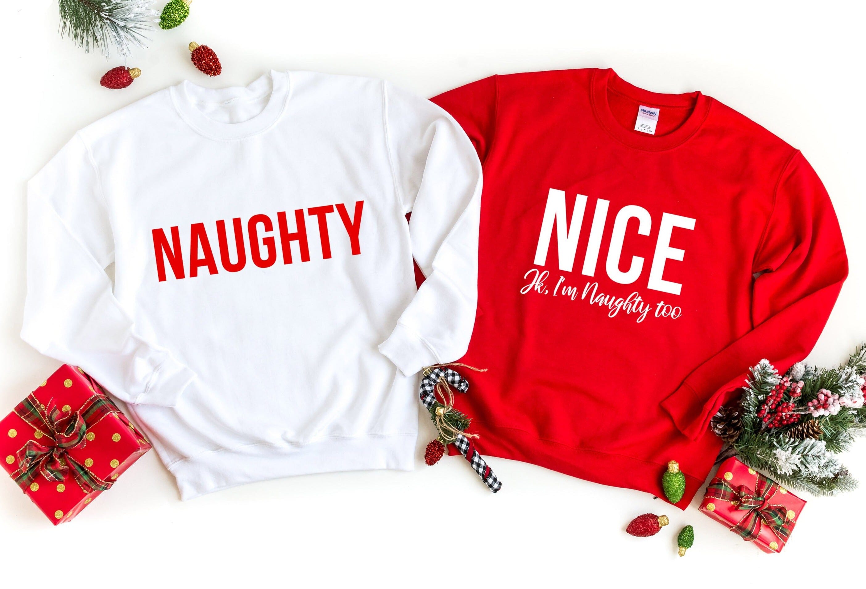 A cozy Nice, Jk I'm Naughty Too Sweatshirt featuring a playful design, perfect for casual wear and attracting compliments.